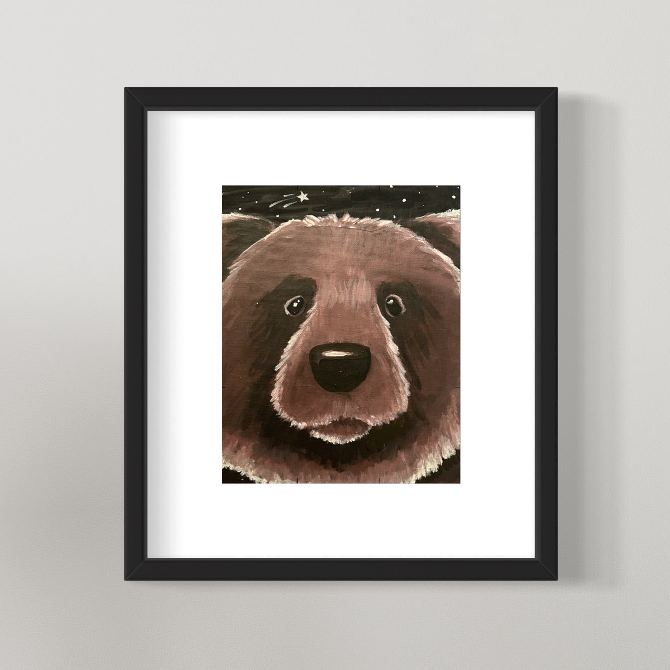 photo of framed curious brown bear painting