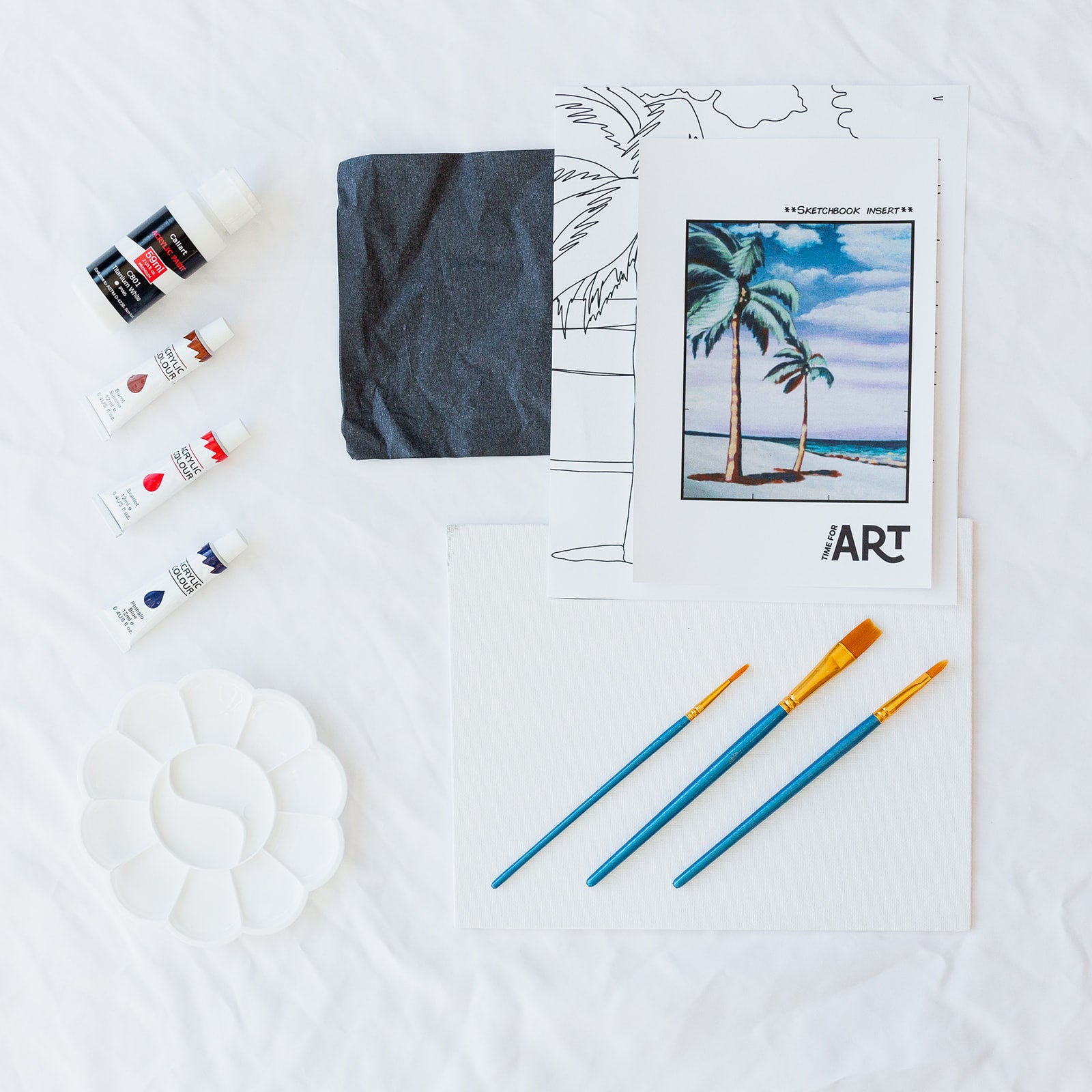 A picture of what is included in the Time For Art Palm Paradise Painting Kit. The DIY Kit comes with 4 paints, a palette, the outline, brushes, canvas and more! 
