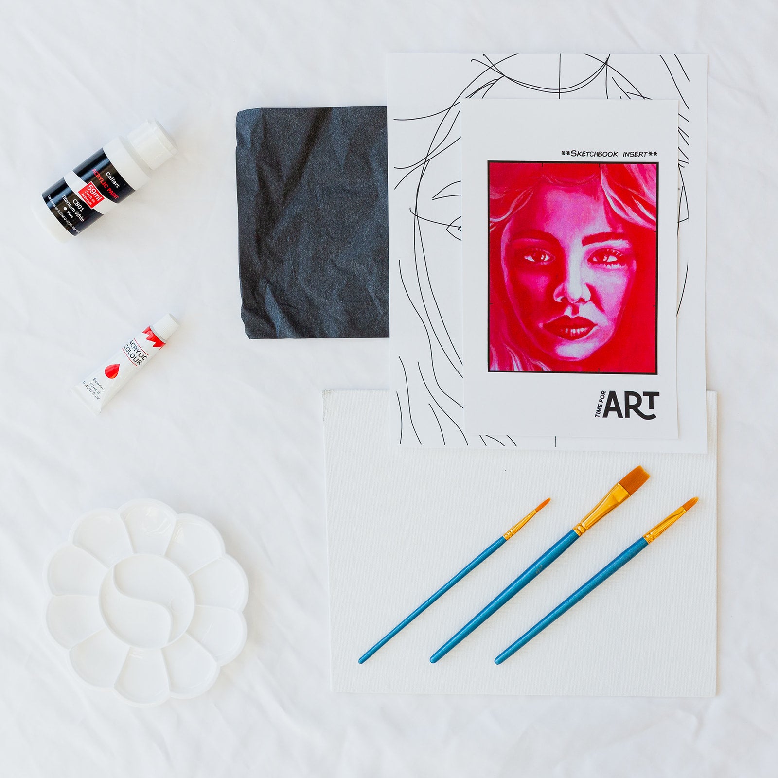A picture of what is included in the Time For Art Red Portrait Kit. The DIY Kit comes with 2 paints, a palette, the outline, brushes, canvas and more! 