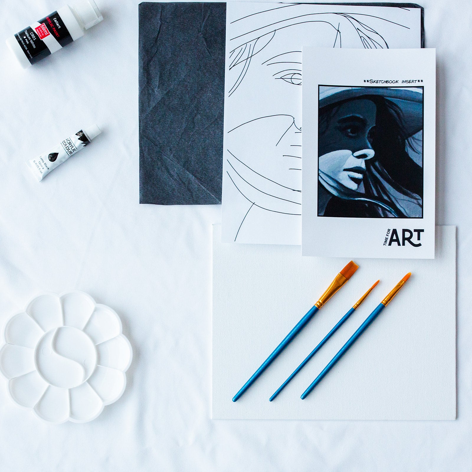 A picture of what is included in the Time For Art Sunhat Female Portrait Painting Kit. The DIY Kit comes with 2 paints, a palette, the outline, brushes, canvas and more! 