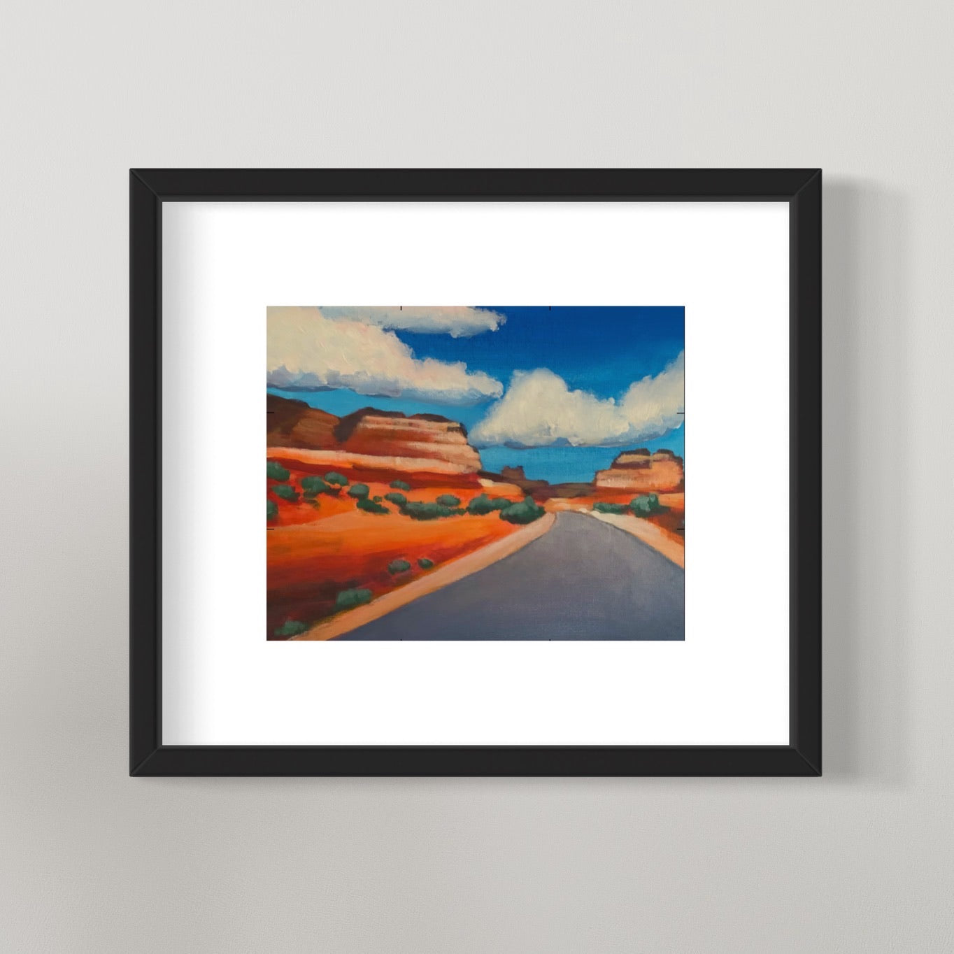 photo of framed desert road painting