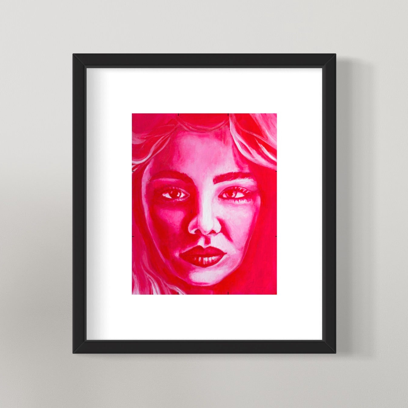photo of framed female face portrait in red painting