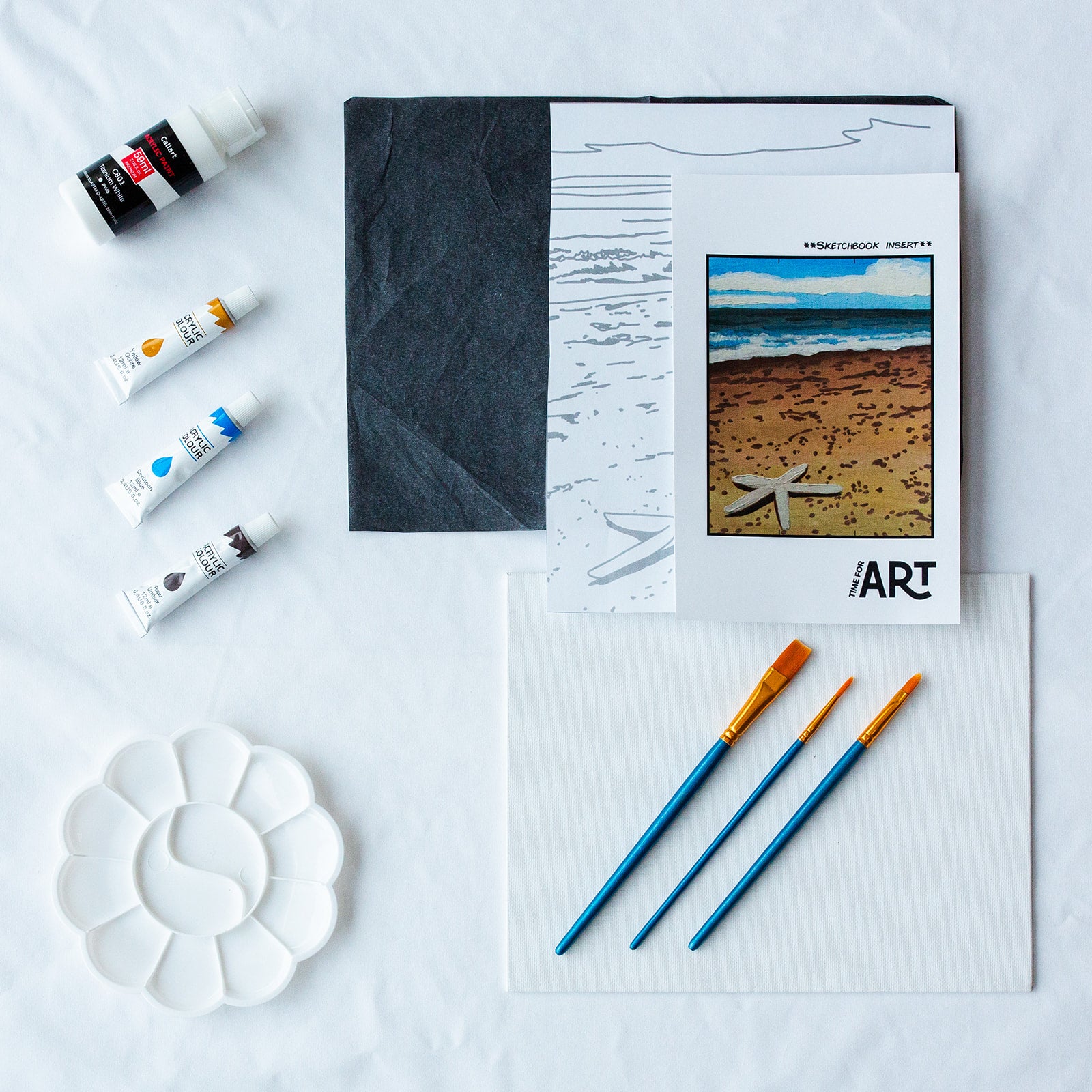 A picture of what is included in the Time for Art  DIY Beach Starfish Painting Kit. This kit comes with 4 paints, a palette, outlines, graphite paper, brushes and a reference image. This kit is great for intermediate painting.