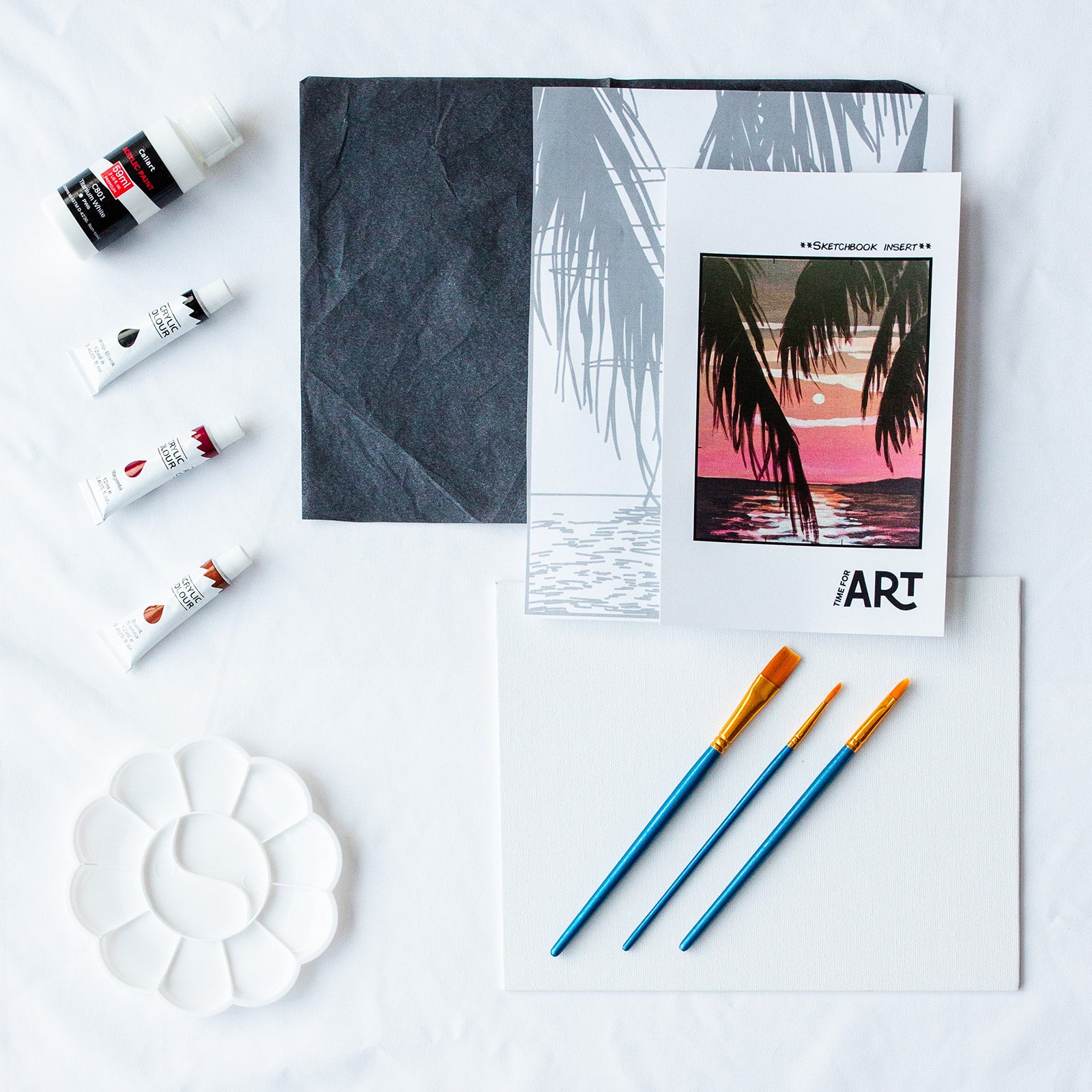 A picture of what is included in the Time For Art Tropical Sunset Painting Kit. The DIY Kit comes with 4 paints, a palette, the outline, brushes, canvas and more! 
