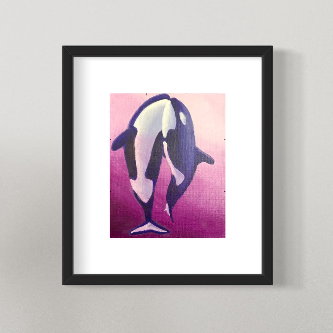 photo of framed dancing orca whales painting